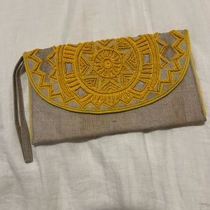 Yellow beaded clutch wristlet